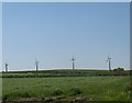 A line of turbines at the Llyn Alaw Wind Farm