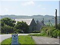 Pedestrians on the dangerous bend on the A5025 by Capel Sardis, Llaneuddog