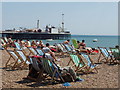 TQ3103 : Deckchairs and sunbathers on a sunny Sunday, Brighton beach by David Hawgood