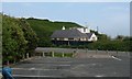 Boarded-up bungalow on the seafront