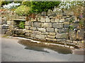 Stone trough opposite the church