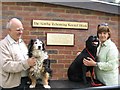 Franci and Kayleigh by the plaque on the new Kennel Runs, Hearing Dogs, Saunderton