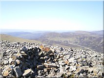 NO1780 : Stone shelter by the summit of Carn an Tuirc by Richard Law