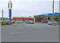 V4679 : Supermarket and petrol station by Dennis Turner