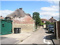 Rear of thatched cottage in Bury Crescent