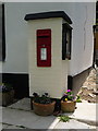 ST8001 : Milton Abbas: postbox and floral display by Chris Downer