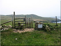 SH2990 : Stile leading on to a concessionary section of the Anglesey Coastal Path by Eric Jones