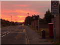 SZ1792 : Christchurch: Mudeford Lane under an orange sky by Chris Downer