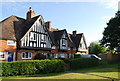 Edwardian almshouses, village green, Weald