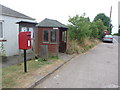 SY4897 : Melplash: postbox № DT6 39 and phone by Chris Downer