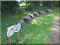 Sculpture of a worm in Platt Fields, Manchester