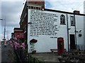 Wall poem and pub tables, Wilmslow Road, Manchester