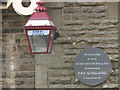 NY7606 : Kirkby Stephen station: lamp and plaque by Stephen Craven