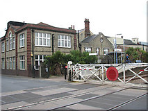 TM0595 : Attleborough railway station - the old crossing gates by Evelyn Simak