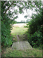 Plank bridge over a ditch