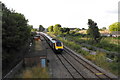 An evening local train pulls out to mainline