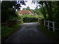 Approaching Huntingford Bridge from Mellow Farm