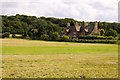 Looking across a field towards Chilswell Farm Cottages