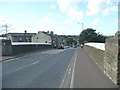 SE1422 : Huddersfield Road (A641) railway bridge, Rastrick by Humphrey Bolton
