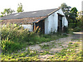 Farm shed beside footpath