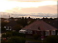 Ensbury Park: a bungalow and clouds