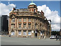 Building on the corner of Miller Street and Corporation Street,  Manchester