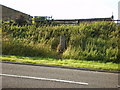 Concrete pillar, beside the A672 at Booth Moor Reservoir