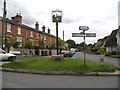 The village sign and Rectory Road at Kedington