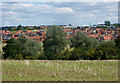 Fields by the River Brett with new housing beyond