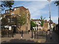 Traffic barrier and "Flying motorcycle" sign, Raveley Street, NW5