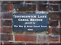 TQ0630 : Plaque on Drungewick Lane Bridge by L S Wilson