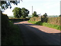 The road to Shute at the junction for Winscott Barton