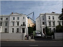 TQ2577 : Buildings on Fulham Road by Derek Harper