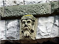 Carved stone head on Rock Cottage