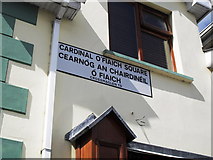 H9115 : Sign, Cardinal O'Fiach Square, Crossmaglen by Dean Molyneaux