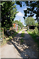 Entrance to agricultural premises east of the school