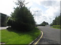 Looking toward the junction of the A6112 and industrial estate road