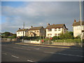 Detached houses opposite the Dundrum Road Industrial Estate