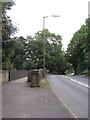 Unstone - View of (B6057) road and footbridge