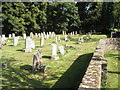 Gravestones in the churchyard at St Peter, Bishop