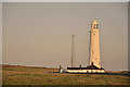 Nash Point Lighthouse at the going down of the sun