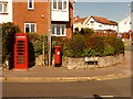 SY3492 : Lyme Regis: postbox № DT7 30 and phone, Anning Road by Chris Downer