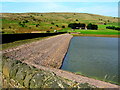 SD9909 : Castleshaw Lower Reservoir dam by John H Darch