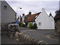 Cottage on the bend in the road.