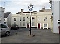 The White Lion Hotel and town sign