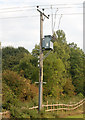 Transformer beside unclassified road in Napton