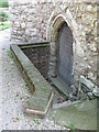 Entrance door on the west side of the tower of St. Nicholas