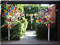 Colourful windmills decorate a garden near to Abingdon town centre