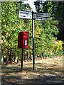 Postbox And Road Sign