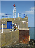 SM9538 : Two beacons, Fishguard harbour by Pauline E